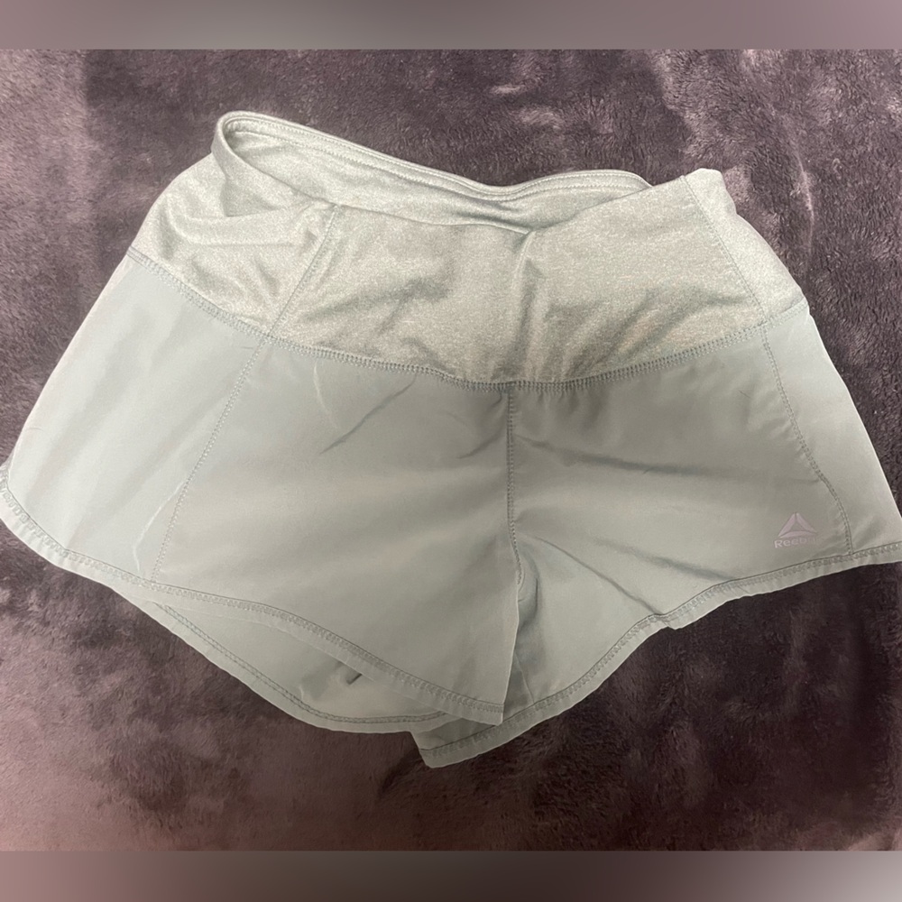 Green Reebok shorts